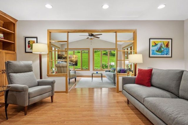 3933 Dartmouth Dr, Minnetonka, MN 55345 - living room with ceiling fan, light wood-style flooring, lofted ceiling, recessed lighting, and baseboards