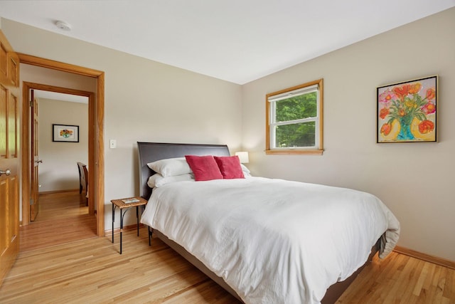 3933 Dartmouth Dr, Minnetonka, MN 55345 - bedroom with baseboards and light wood-style floors