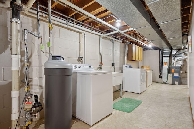3933 Dartmouth Dr, Minnetonka, MN 55345 - unfinished basement featuring washing machine and clothes dryer, a water softener, concrete block wall, and heating unit