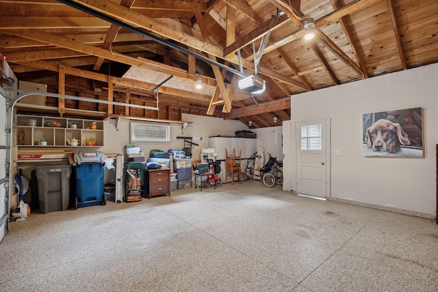 3933 Dartmouth Dr, Minnetonka, MN 55345 - garage with a garage door opener and wood ceiling