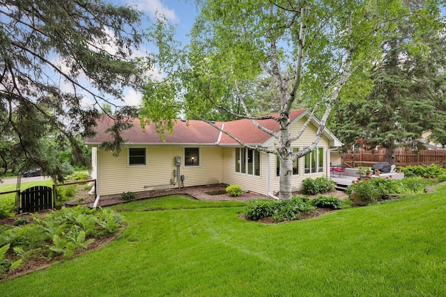 3933 Dartmouth Dr, Minnetonka, MN 55345 - back of house featuring a wooden deck