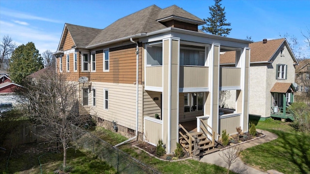 405 7th St S, Virginia, MN 55792 - view of home's exterior with a shingled roof