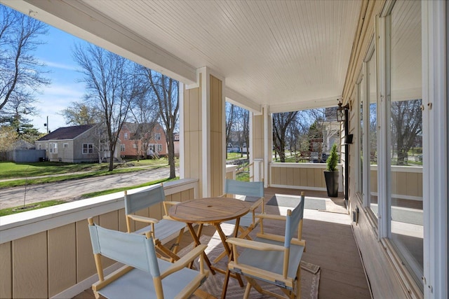 405 7th St S, Virginia, MN 55792 - sunroom / solarium featuring a residential view