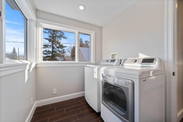 405 7th St S, Virginia, MN 55792 - washroom with washer and clothes dryer, baseboards, dark wood-type flooring, and recessed lighting