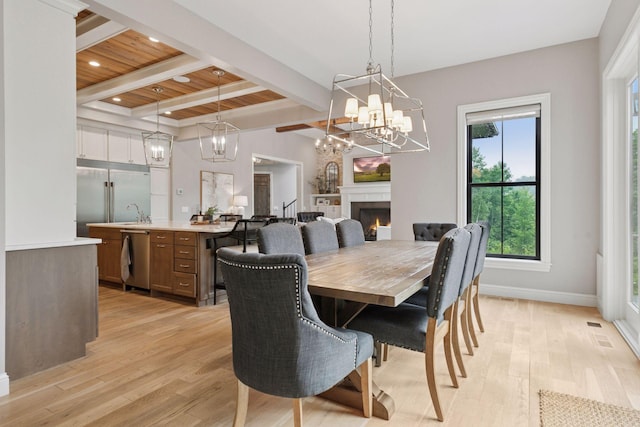 1432 25th St, Saint Joseph Twp, WI 54082 - dining area featuring a chandelier, light wood-style floors, a lit fireplace, recessed lighting, and wooden ceiling with exposed beams
