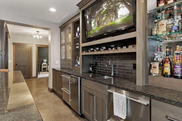 1432 25th St, Saint Joseph Twp, WI 54082 - indoor wet bar with concrete flooring, stainless steel dishwasher, tasteful backsplash, recessed lighting, and a chandelier