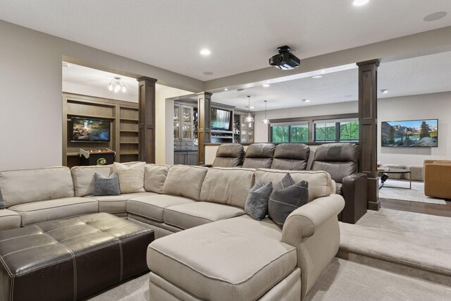 1432 25th St, Saint Joseph Twp, WI 54082 - living room with ornate columns, recessed lighting, and light colored carpet