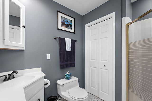 1665 Canary Ln, Mound, MN 55364 - full bathroom featuring a closet, vanity, toilet, and a shower