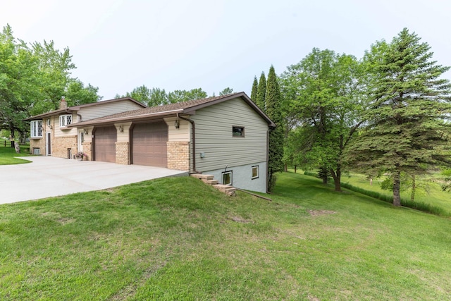 23725 240th Ave, Aurdal Twp, MN 56537 - view of front of property with a front yard, driveway, a chimney, a garage, and brick siding