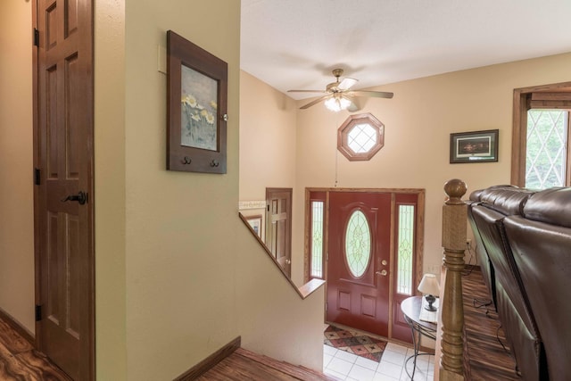 23725 240th Ave, Aurdal Twp, MN 56537 - entryway featuring a ceiling fan, baseboards, and tile patterned flooring