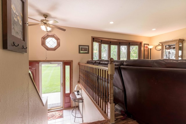 23725 240th Ave, Aurdal Twp, MN 56537 - stairway with ceiling fan and tile patterned floors