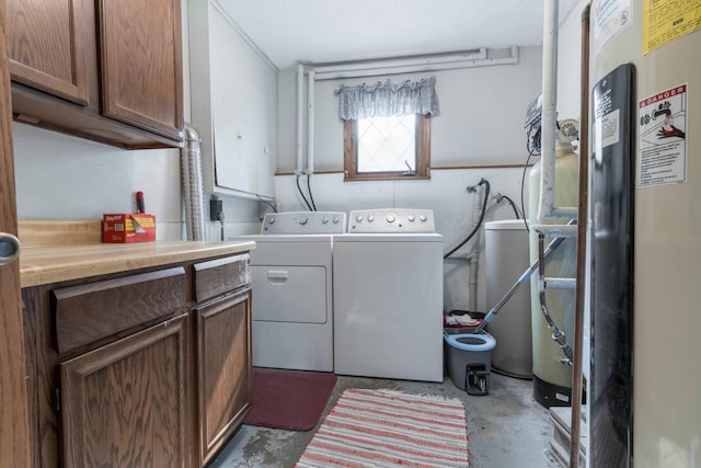 23725 240th Ave, Aurdal Twp, MN 56537 - laundry area featuring cabinet space, washer and clothes dryer, and electric water heater