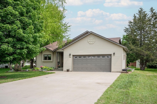 106 4th Ave NW, Rice, MN 56367 - single story home with driveway, a front yard, and a garage