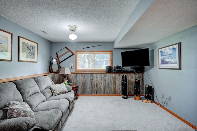 106 4th Ave NW, Rice, MN 56367 - carpeted living room featuring a textured ceiling and wooden walls