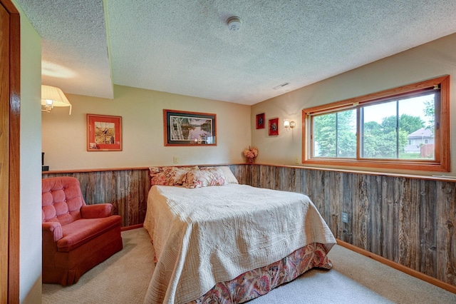 106 4th Ave NW, Rice, MN 56367 - carpeted bedroom with a textured ceiling