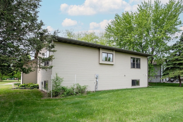 106 4th Ave NW, Rice, MN 56367 - view of side of home with a yard