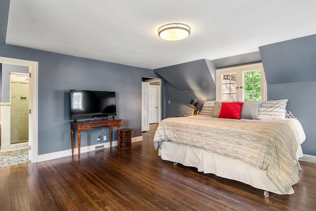 808 4th St SW, Austin, MN 55912 - bedroom featuring wood finished floors, vaulted ceiling, baseboards, and french doors