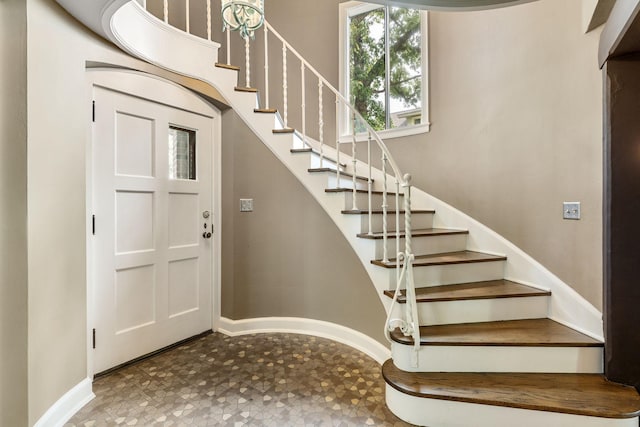808 4th St SW, Austin, MN 55912 - foyer with stairs and tile patterned floors