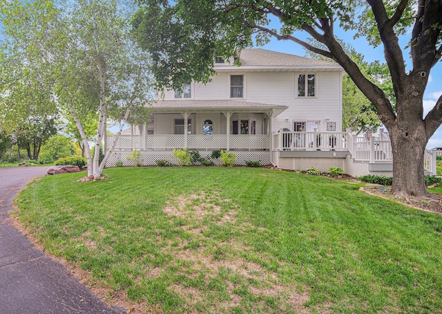 102 Walnut Ave, Luverne, MN 56156 - view of front of house featuring a front lawn and covered porch