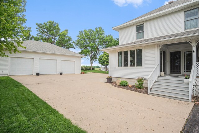 102 Walnut Ave, Luverne, MN 56156 - view of home's exterior with an outbuilding and a detached garage