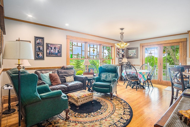 102 Walnut Ave, Luverne, MN 56156 - living room featuring light wood finished floors, healthy amount of natural light, ornamental molding, and recessed lighting