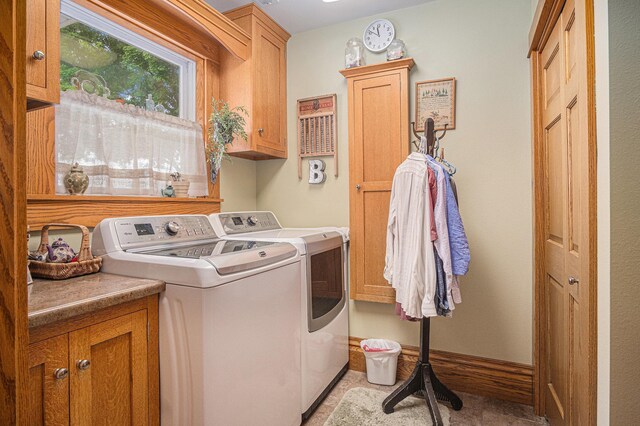 102 Walnut Ave, Luverne, MN 56156 - laundry area with cabinet space, washer and dryer, and baseboards