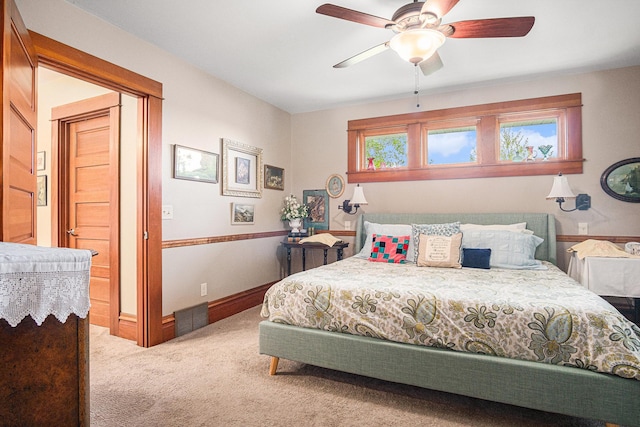 102 Walnut Ave, Luverne, MN 56156 - bedroom featuring carpet floors, baseboards, and a ceiling fan