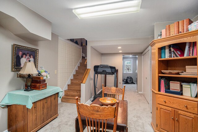 102 Walnut Ave, Luverne, MN 56156 - dining room featuring light carpet and stairs