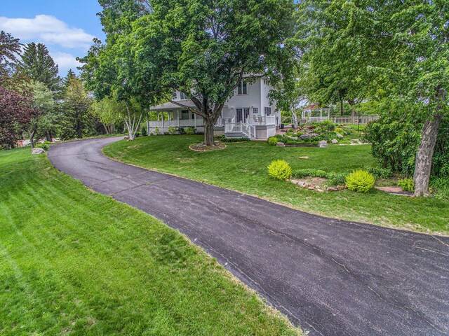 102 Walnut Ave, Luverne, MN 56156 - view of front facade featuring a front yard