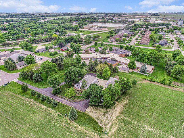 102 Walnut Ave, Luverne, MN 56156 - aerial view of residential area with a large body of water