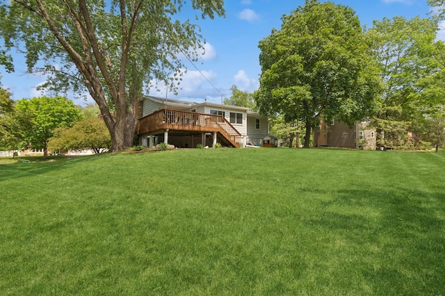 15613 Boulder Creek Dr, Minnetonka, MN 55345 - view of grassy yard featuring stairway and a wooden deck