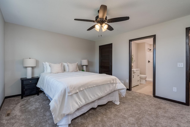 3203 Scotch Ln, Mankato, MN 56001 - bedroom with light carpet, baseboards, a ceiling fan, and ensuite bath