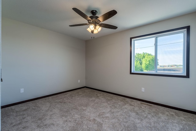 3203 Scotch Ln, Mankato, MN 56001 - carpeted empty room with baseboards and ceiling fan