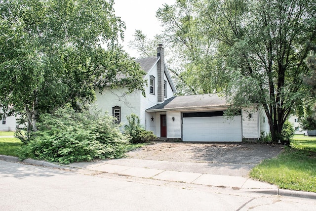 808 Franklin Ave, Wabasha, MN 55981 - view of front of house with driveway and a garage