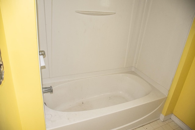 808 Franklin Ave, Wabasha, MN 55981 - bathroom featuring tile patterned flooring and a bathtub