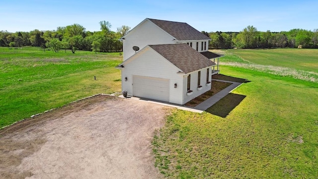 13985 120th St N, Stillwater, MN 55082 - view of home's exterior featuring driveway, a yard, and an attached garage