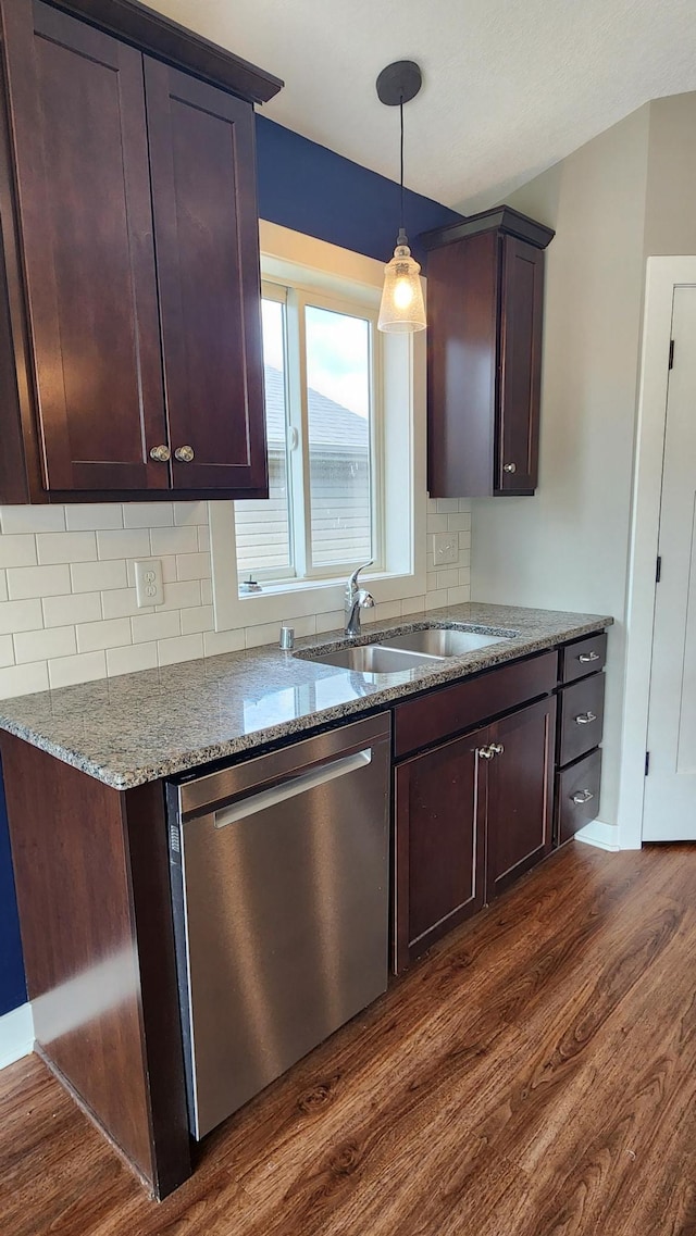 5687 Prosper Ave NW, Rochester, MN 55901 - kitchen featuring stainless steel dishwasher, dark wood-style floors, backsplash, light stone counters, and a sink