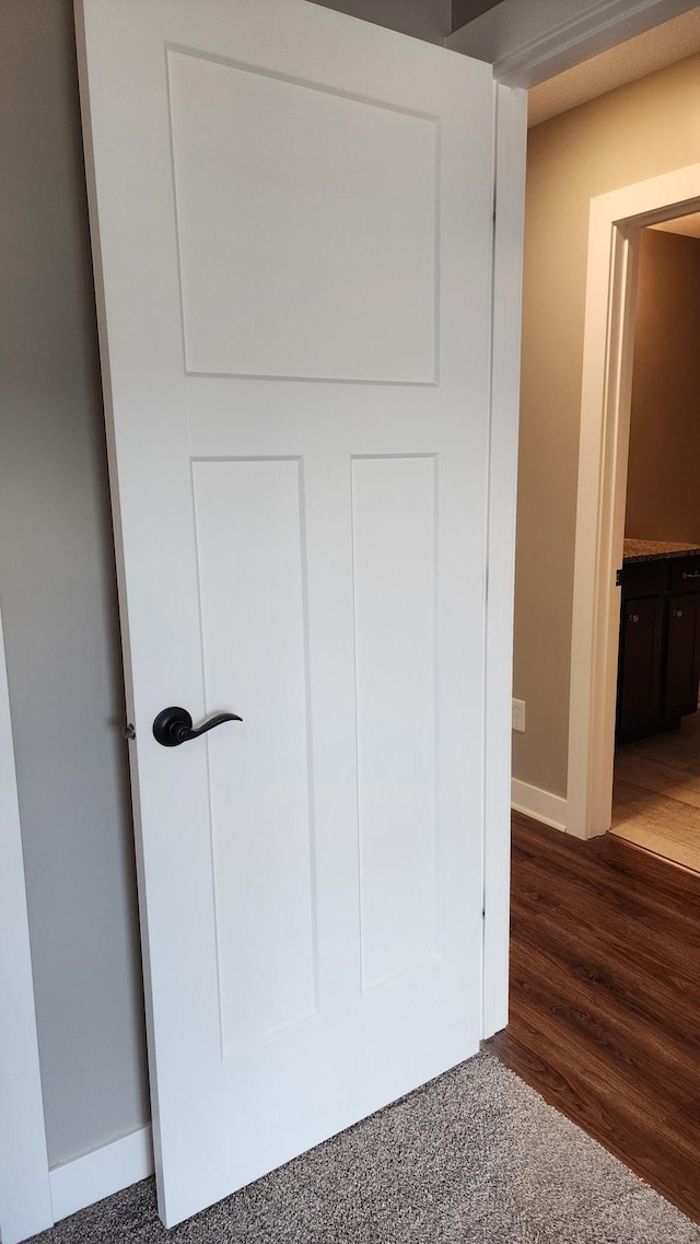 5687 Prosper Ave NW, Rochester, MN 55901 - detailed view of baseboards and wood finished floors