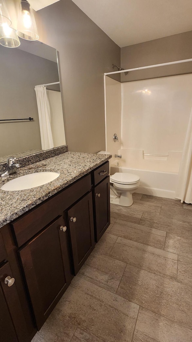 5687 Prosper Ave NW, Rochester, MN 55901 - full bath with vanity, shower / tub combo with curtain, and toilet