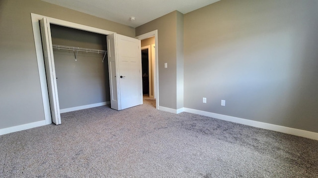 5687 Prosper Ave NW, Rochester, MN 55901 - unfurnished bedroom featuring carpet, baseboards, and a closet