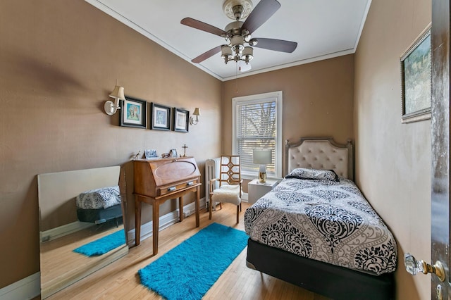 2518 Blaisdell Ave S Unit 1, Minneapolis, MN 55404 - bedroom featuring ornamental molding, wood finished floors, baseboards, and ceiling fan