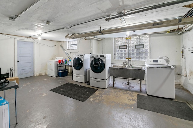 2518 Blaisdell Ave S Unit 1, Minneapolis, MN 55404 - basement with washing machine and dryer and a sink