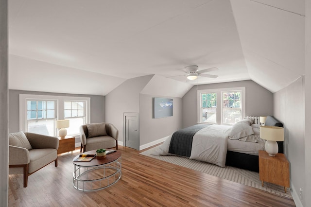 1195 Minnehaha Ave E, Saint Paul, MN 55106 - bedroom with vaulted ceiling, wood finished floors, baseboards, and ceiling fan
