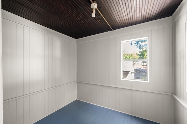 1195 Minnehaha Ave E, Saint Paul, MN 55106 - unfurnished room featuring wood ceiling and dark wood-type flooring