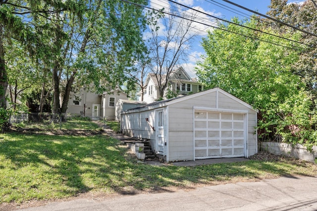 1195 Minnehaha Ave E, Saint Paul, MN 55106 - view of front facade with a garage and an outdoor structure