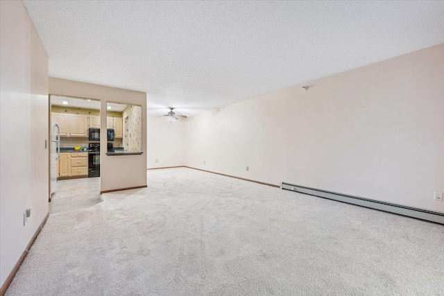 5645 Green Circle Dr Unit 210, Minnetonka, MN 55343 - unfurnished living room featuring baseboard heating, light carpet, a ceiling fan, and a textured ceiling