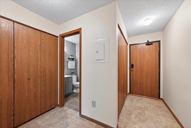 5645 Green Circle Dr Unit 210, Minnetonka, MN 55343 - hall with a textured ceiling and electric panel
