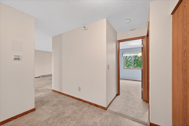 5645 Green Circle Dr Unit 210, Minnetonka, MN 55343 - hallway with carpet, a textured ceiling, and baseboard heating