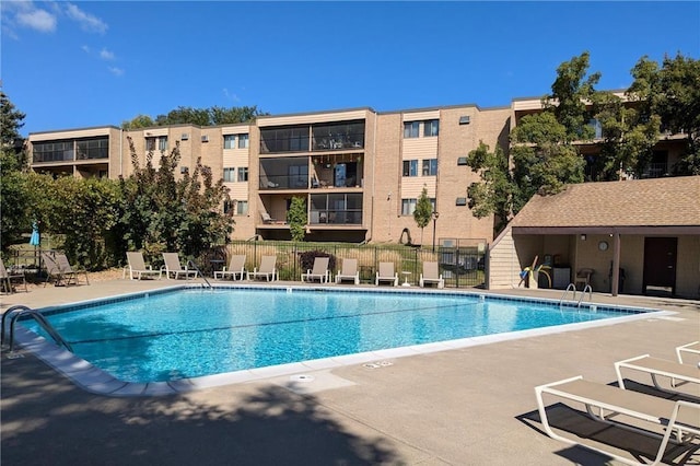 5645 Green Circle Dr Unit 210, Minnetonka, MN 55343 - community pool featuring a patio