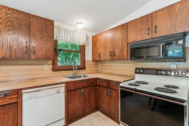 15812 Woodgate Rd N, Minnetonka, MN 55345 - kitchen featuring range with electric cooktop, dishwasher, black microwave, a sink, and light flooring